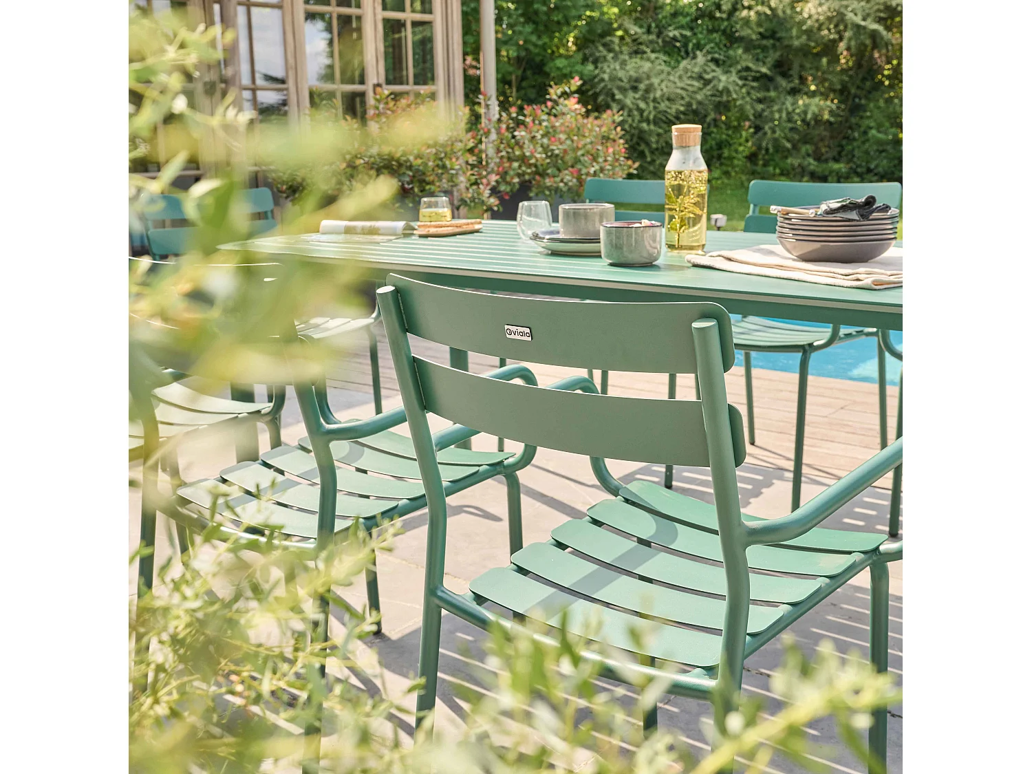 Ensemble table de jardin et 8 fauteuils vert foncé