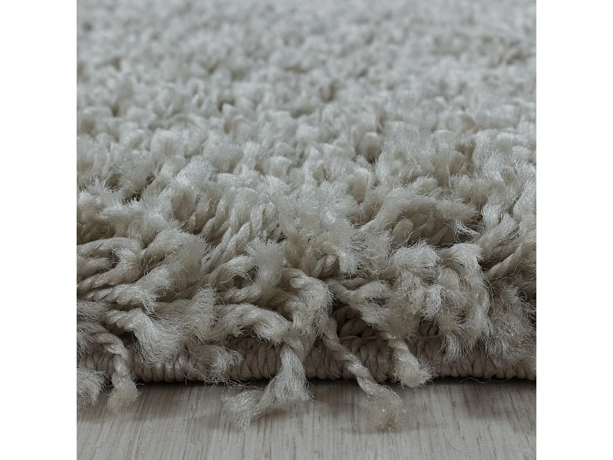 Tapis rond poils longs shaggy Ø160cm tissé beige motif uni UNI I
