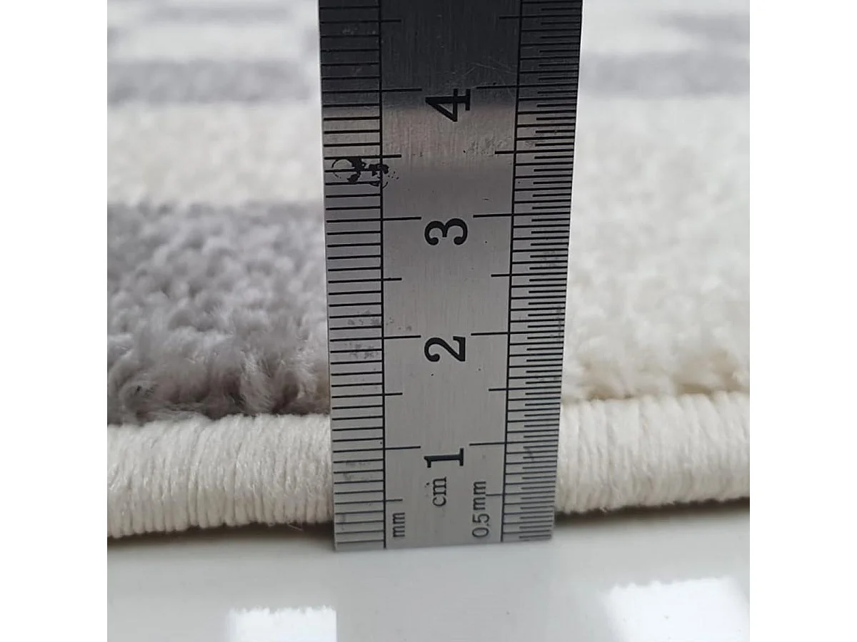 tapis chambre 60x110 tissé crème rectangle motif géométrique EFFACT