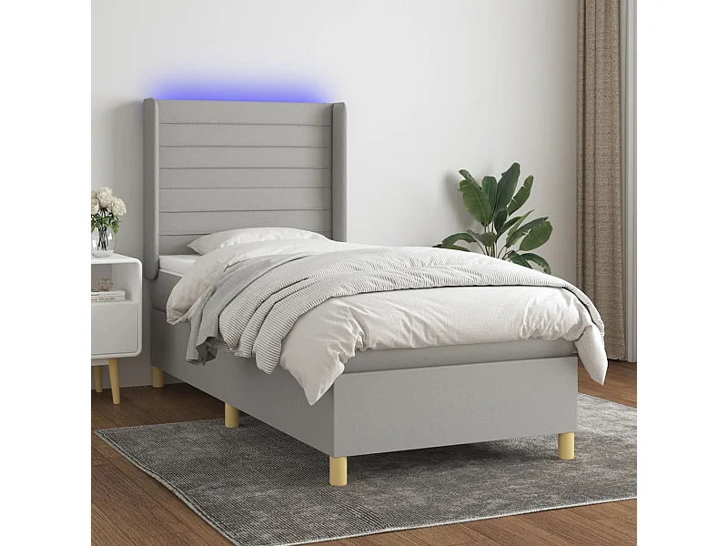 Cama box spring colchón y luces LED tela gris claro 90x200 cm