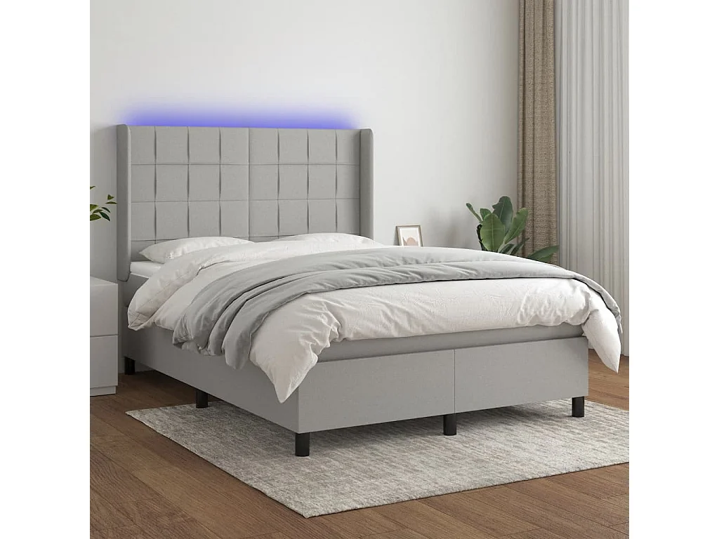Boxspring met matras en LED stof lichtgrijs 140x190 cm