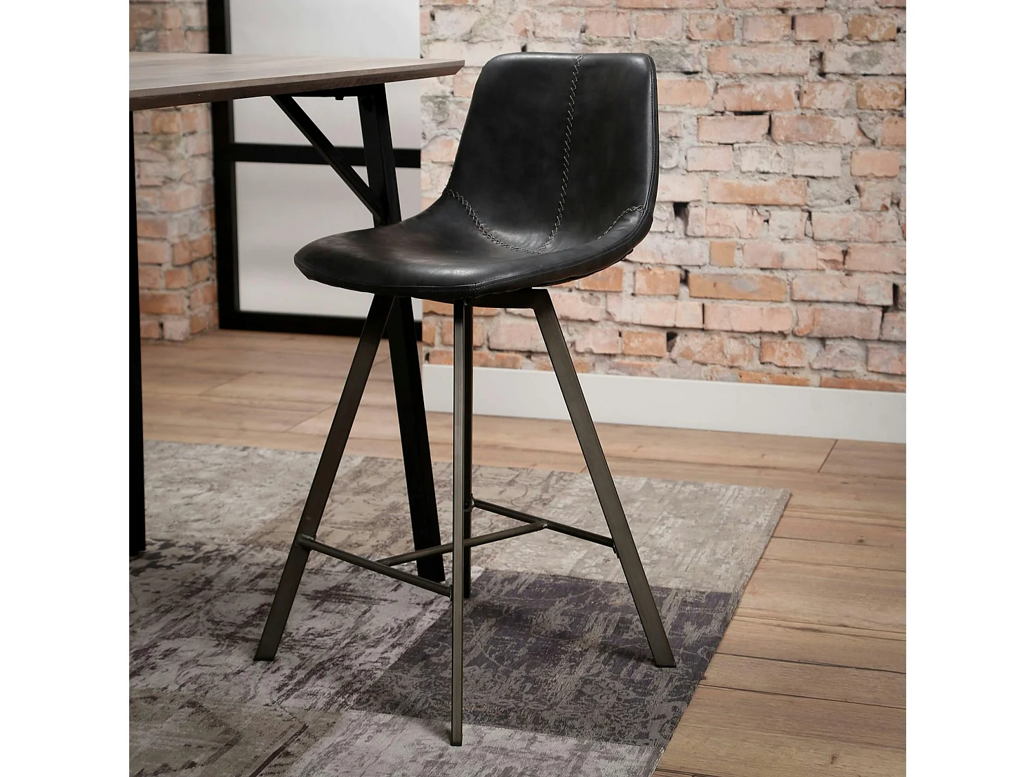 Chaise de bar anthracite coutures apparentes pieds étoile HELSINKI