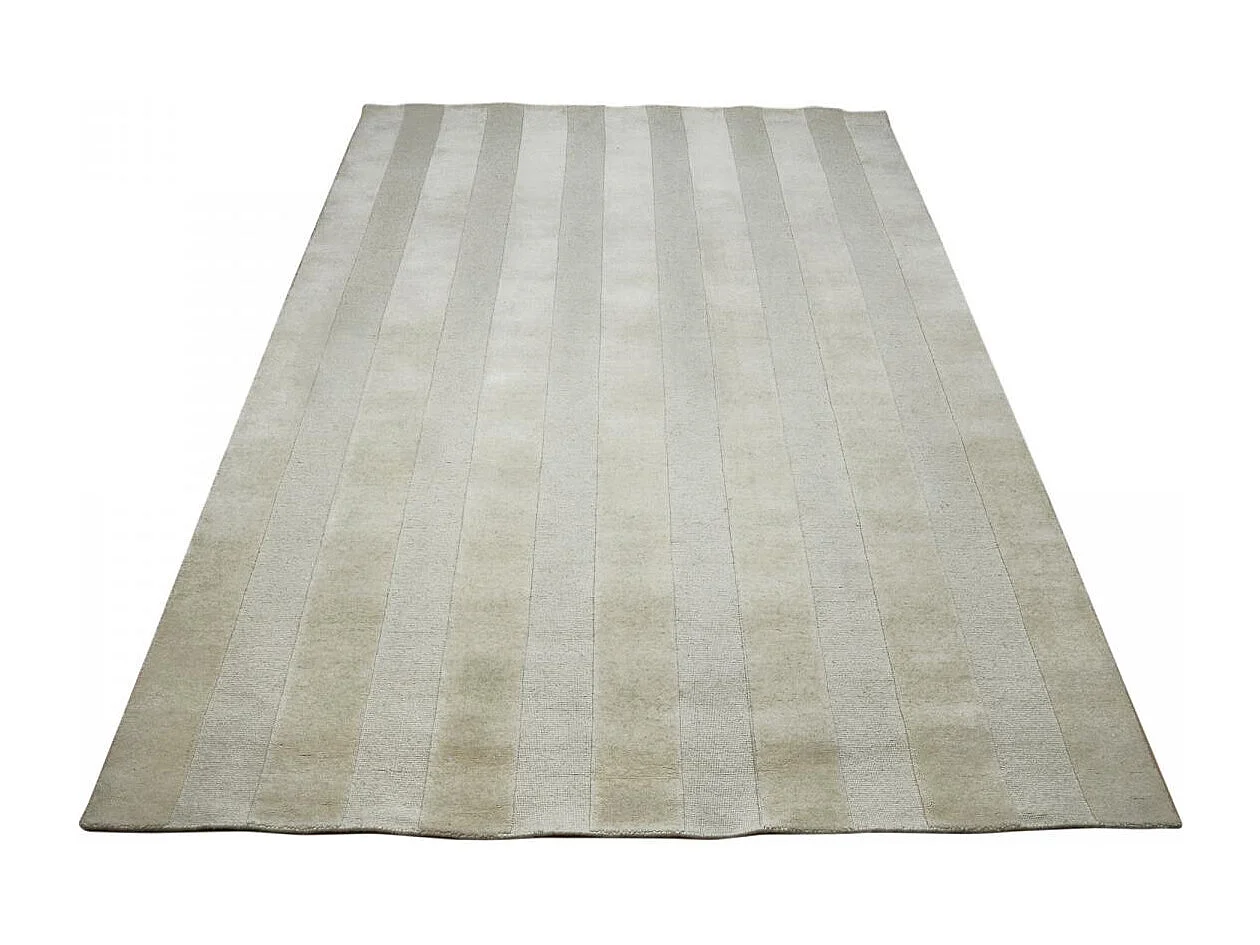 tapis salon 200x290 fait à la main en laine beige rectangle motif uni BANDA