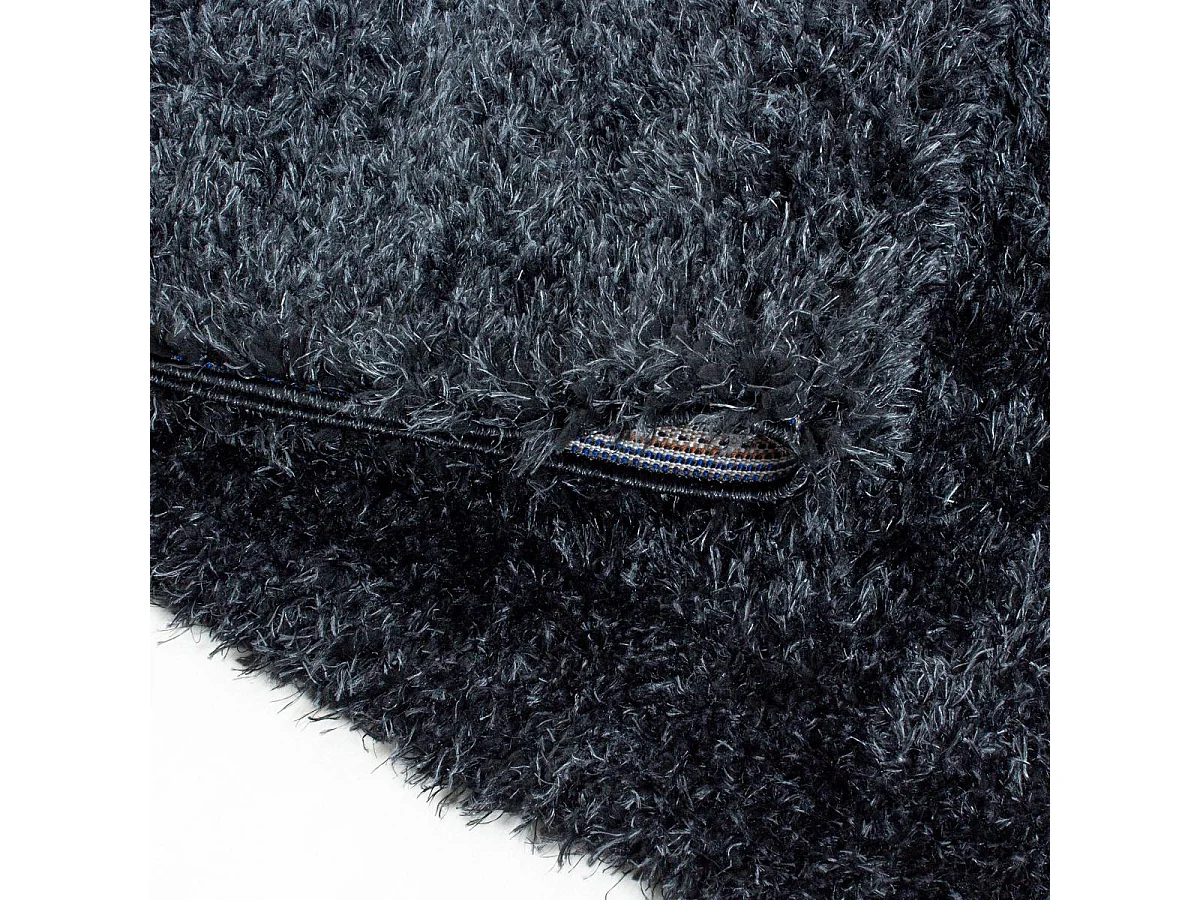 Tapis longs poils shaggy Ø120cm rond tissé noir motif uni UNI A