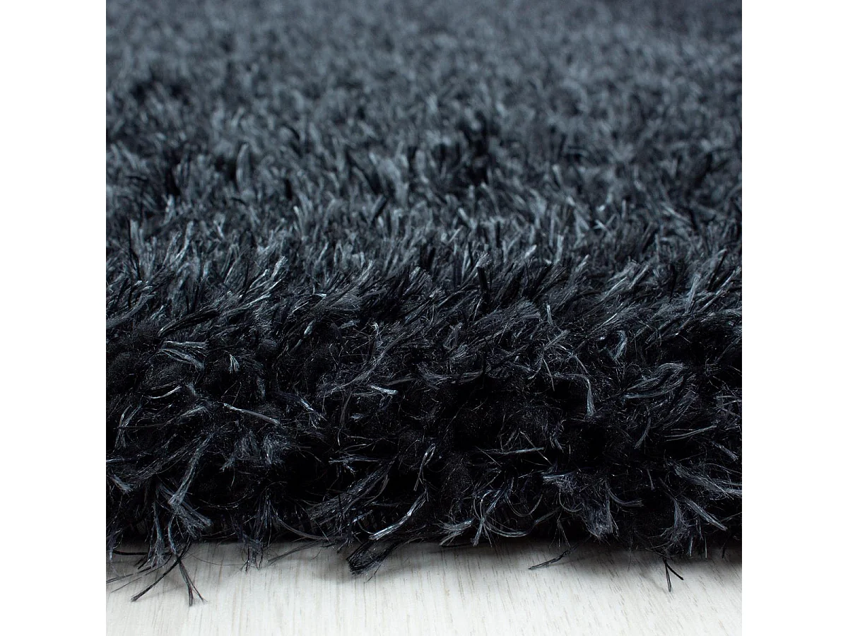 Tapis rond longs poils shaggy Ø120cm tissé noir motif uni UNI A
