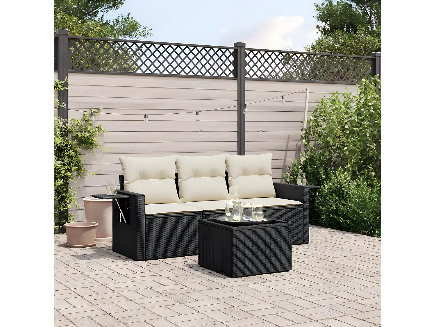 Salon de jardin 4 pcs avec coussins noir résine tressée