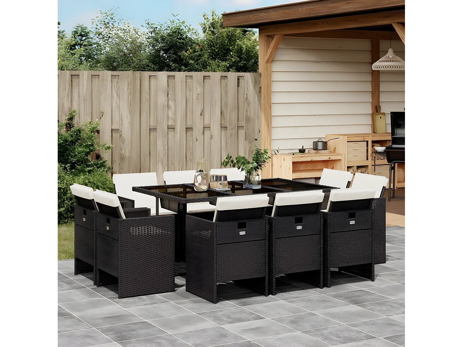 Ensemble à manger de jardin 11 pcs coussins noir résine tressée