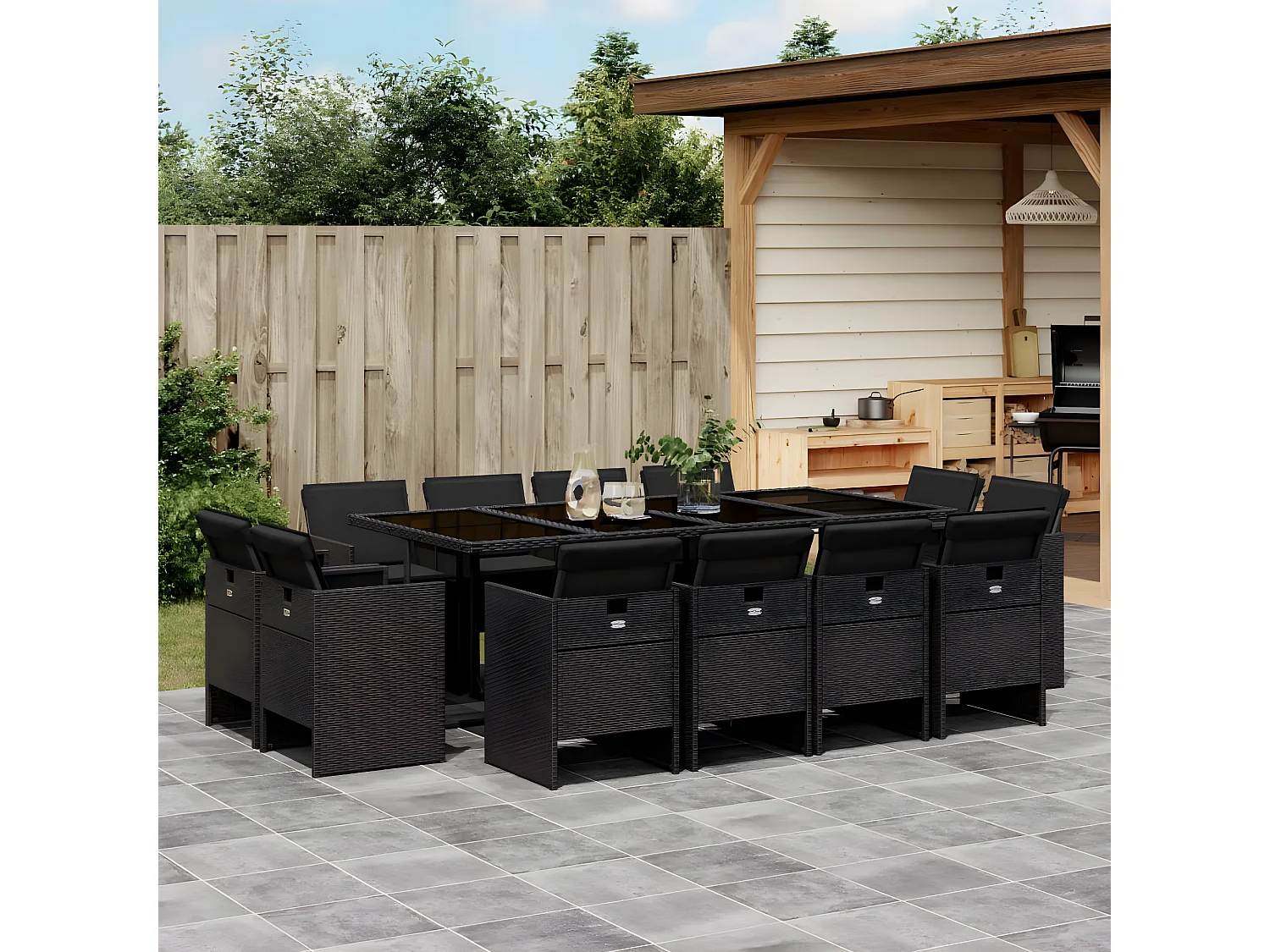 Ensemble à manger de jardin 13 pcs coussins noir résine tressée