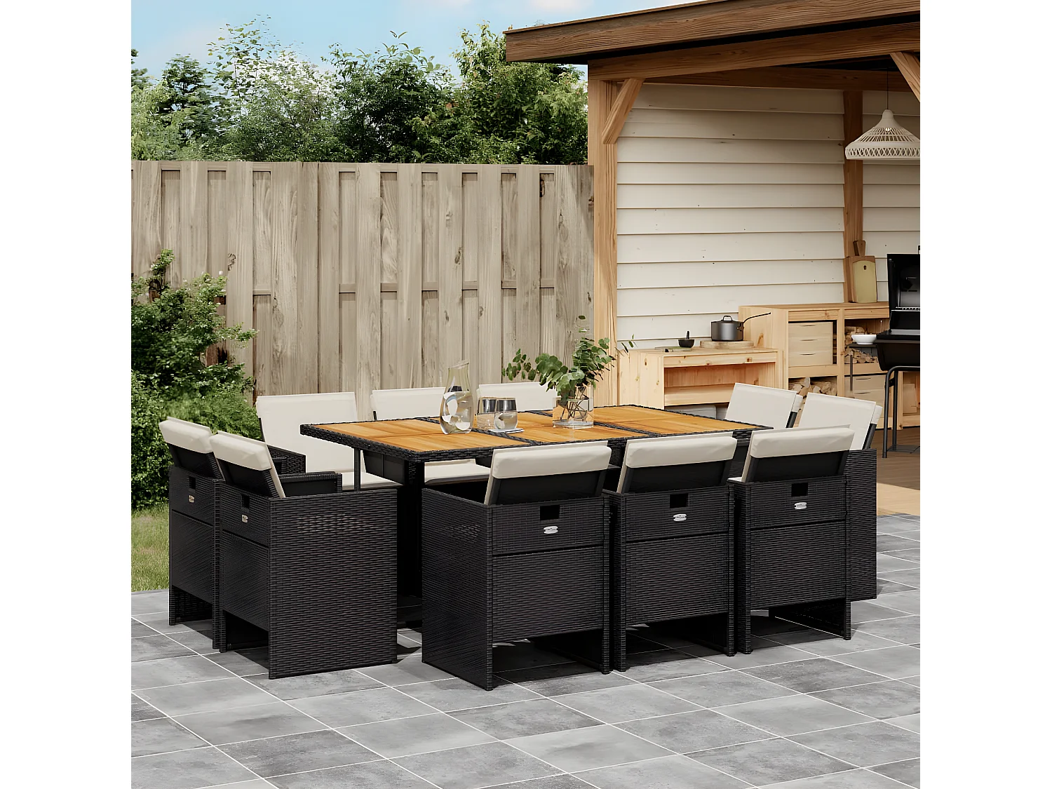 Ensemble à manger de jardin 11 pcs coussins noir résine tressée