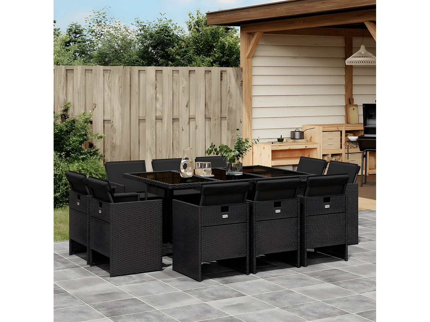 Ensemble à manger de jardin 11 pcs coussins noir résine tressée