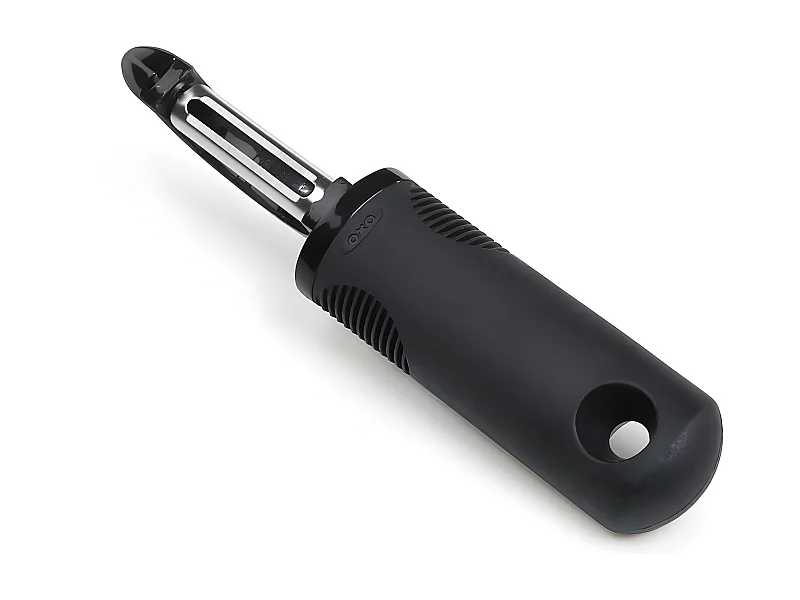 Eplucheur ergonomique lame dentelée