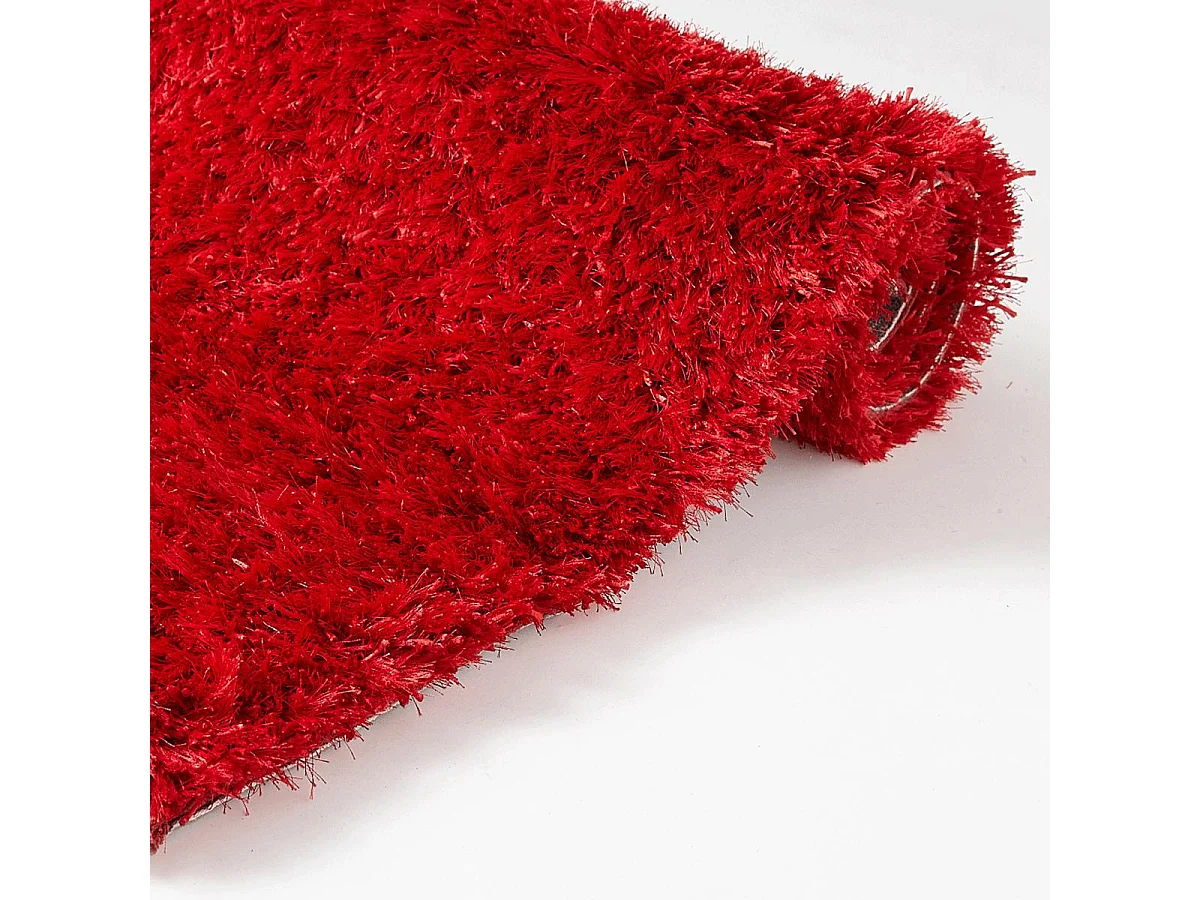Tapis shaggy Ø140cm rond fait main rouge motif uni MALAIDORY