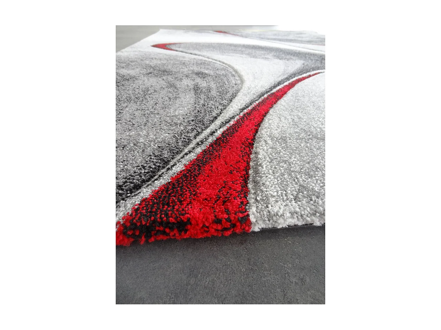 tapis salon Ø140cm tissé rouge et gris rond motif géométrique MILAR