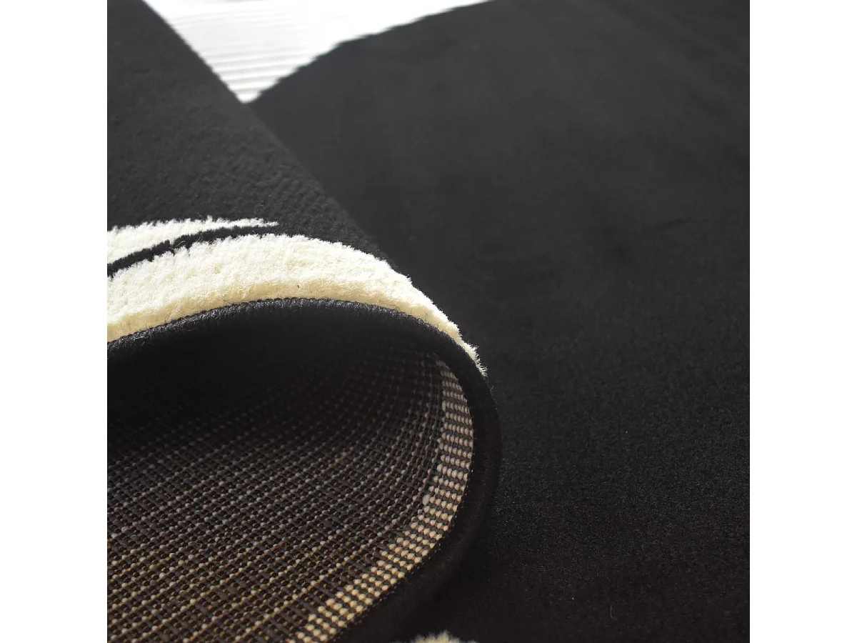 tapis salon 120x170 tissé noir et blanc rectangle motif géométrique LYN1 VINILO