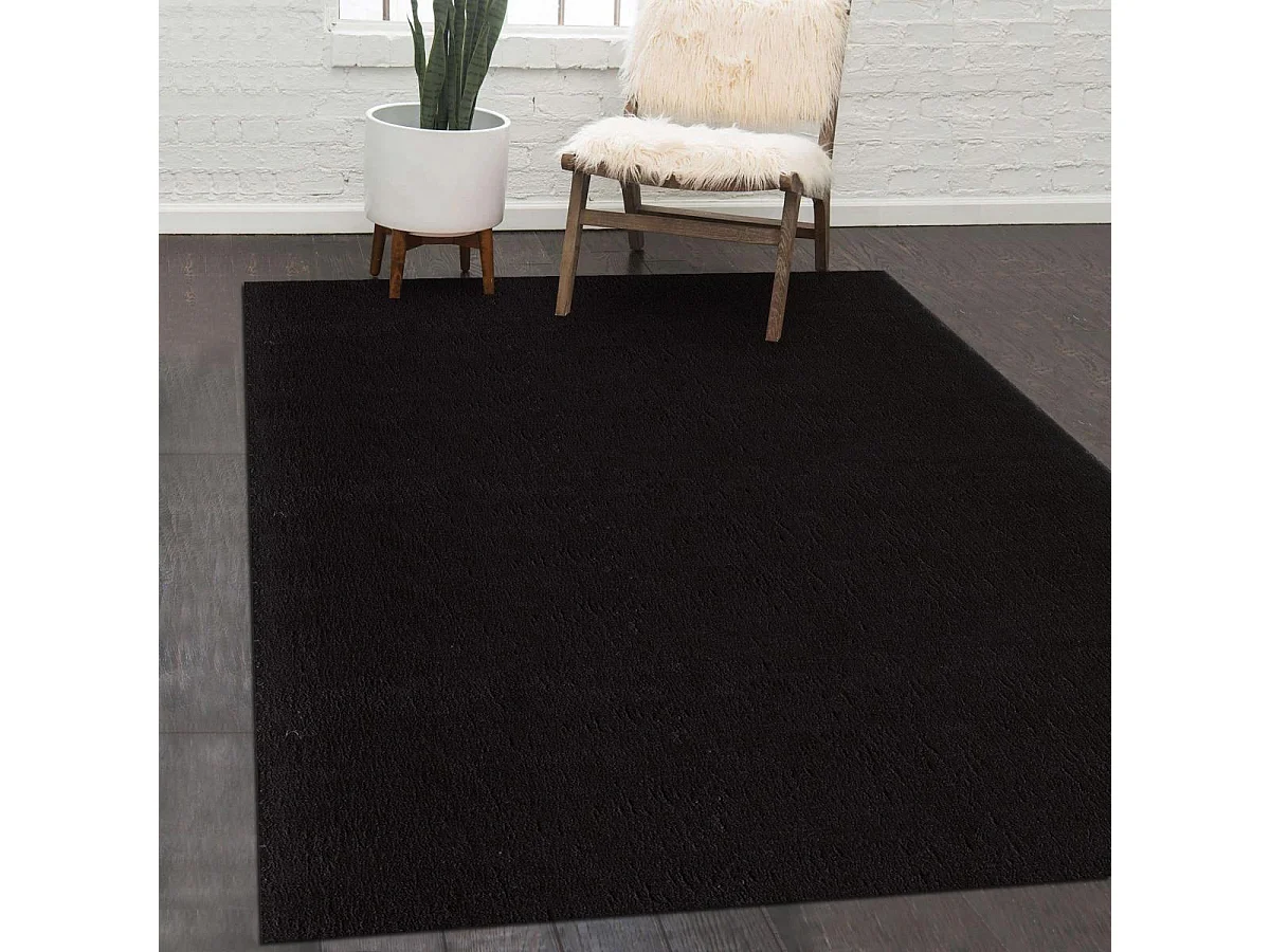 tapis salle de réception Ø80cm tissé noir rond motif uni ANVIK