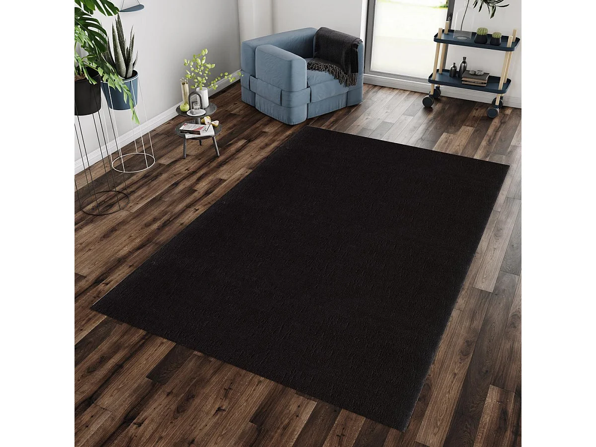 tapis salle de réception Ø80cm tissé noir rond motif uni ANVIK