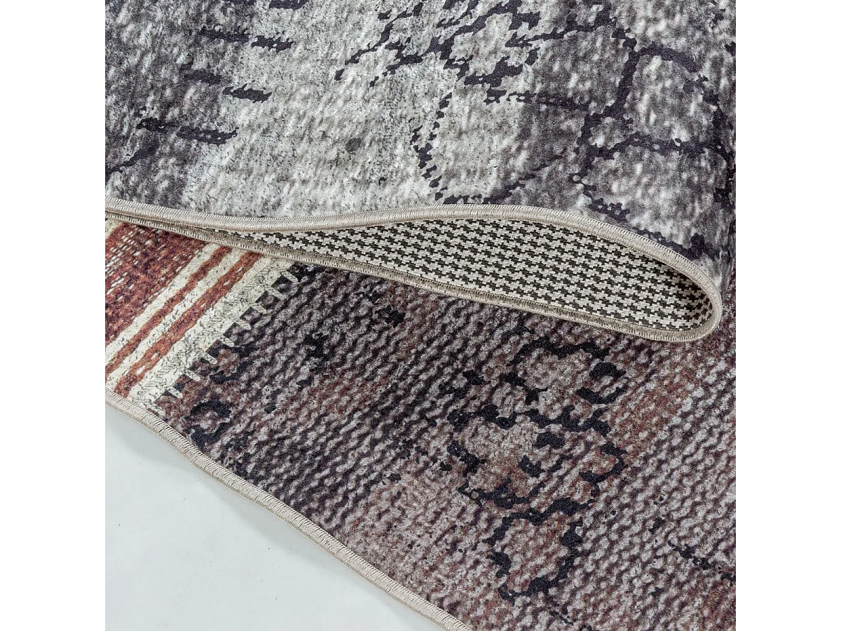 tapis salle à manger 160x230 tissé orange et noir rectangle motif oriental AKIOK