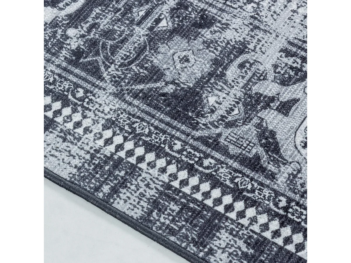Tapis orient 120x170 rectangle noir tissé motifs orientaux AKIAK