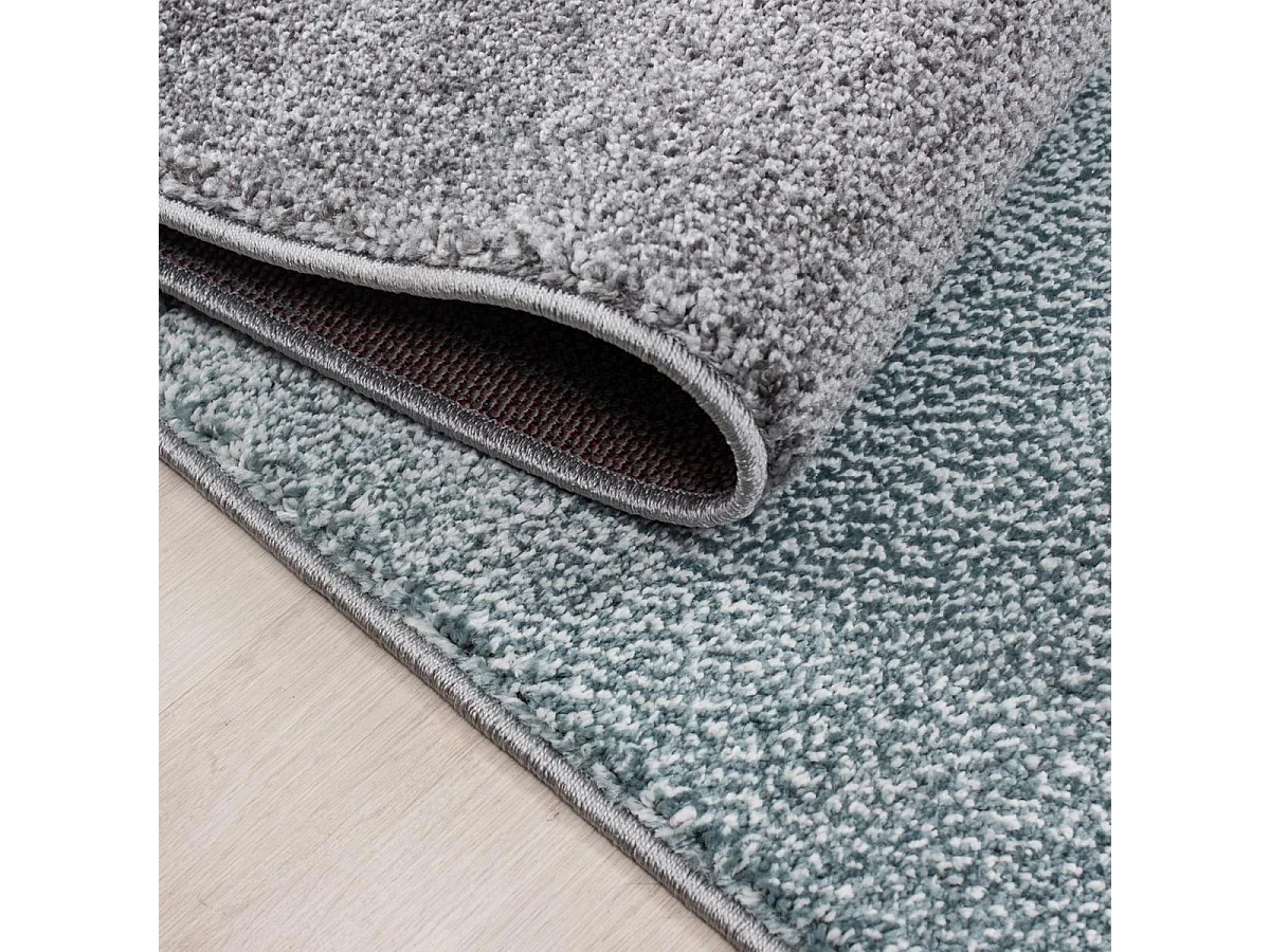 tapis salon 140x200 tissé bleu et gris rectangle motif géométrique KARLUK