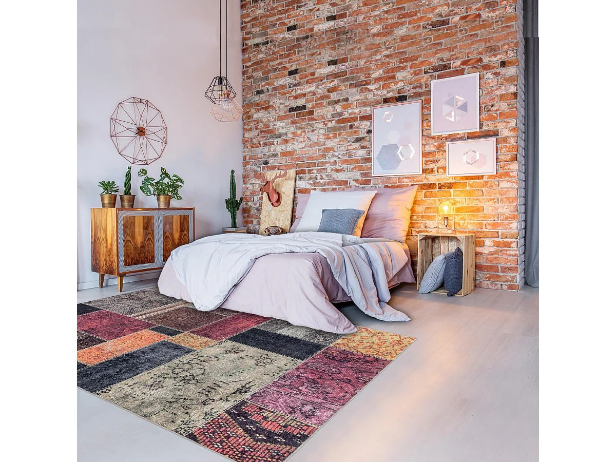 tapis chambre 120x170 tissé orange et noir rectangle motif oriental AKIOK