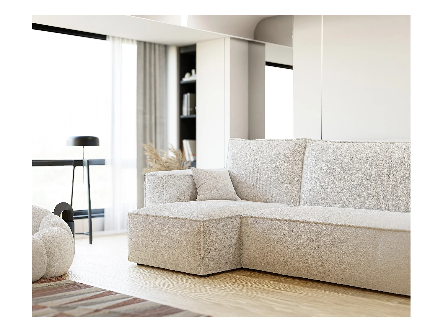 Hoekslaapbank Parijs omkeerbaar om te bouwen tot crèmekleurige boucléstof.