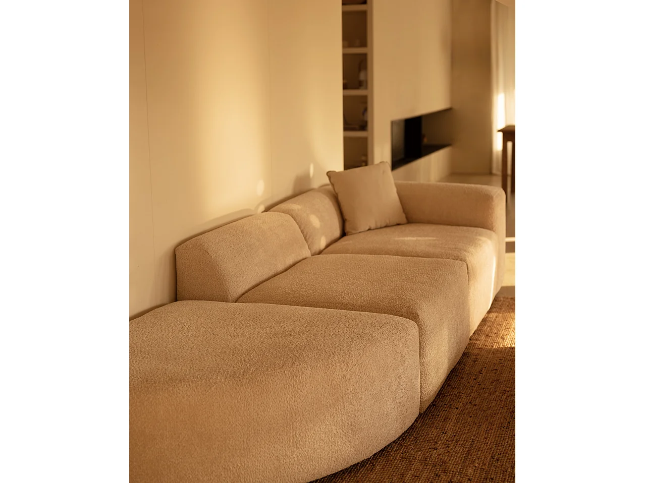 Divano a 3 moduli curva a sinistra in bouclé colore beige 320x110cm