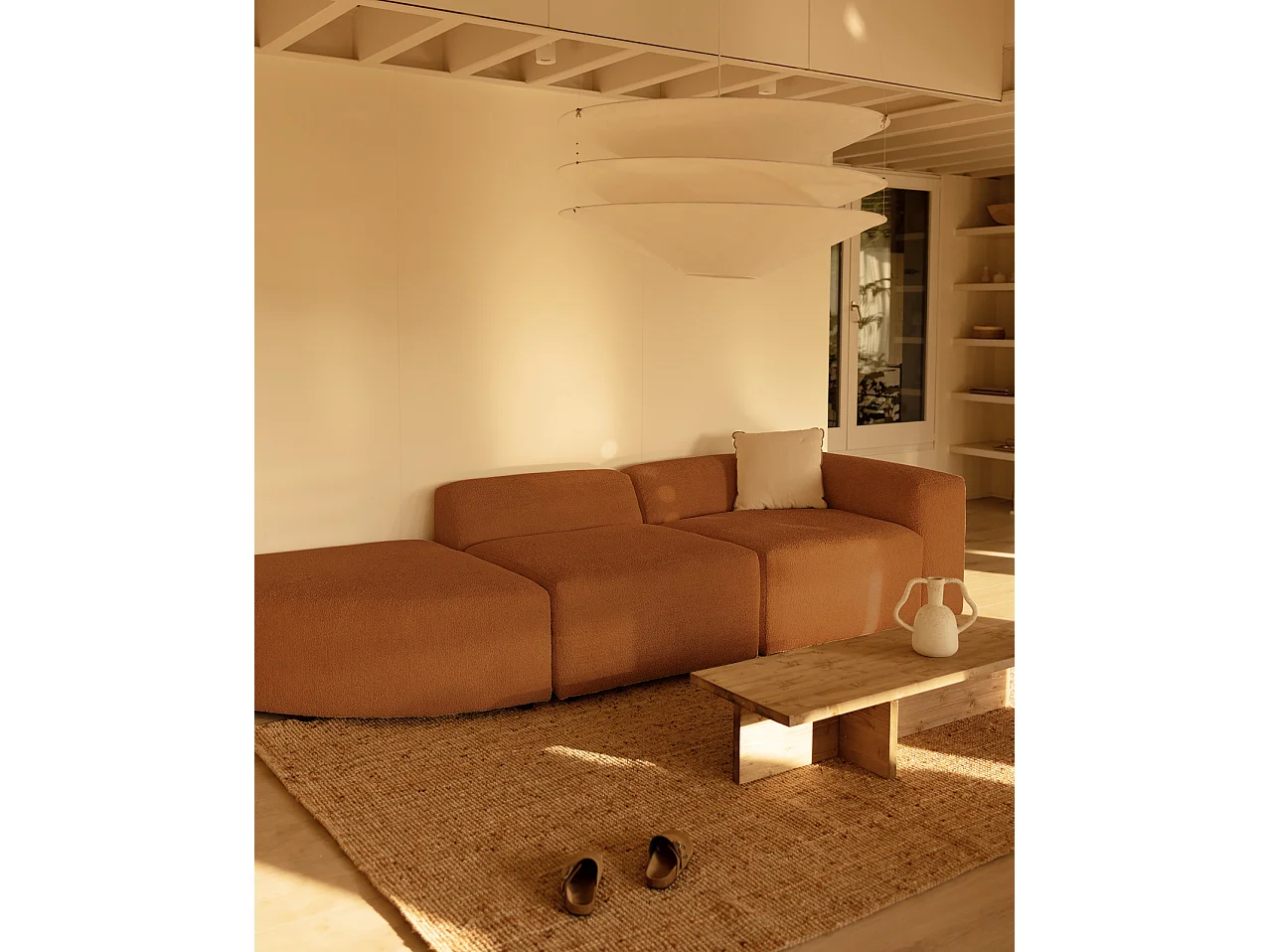 Divano a 3 moduli con curva a sinistra in bouclé colore rame 320x110cm