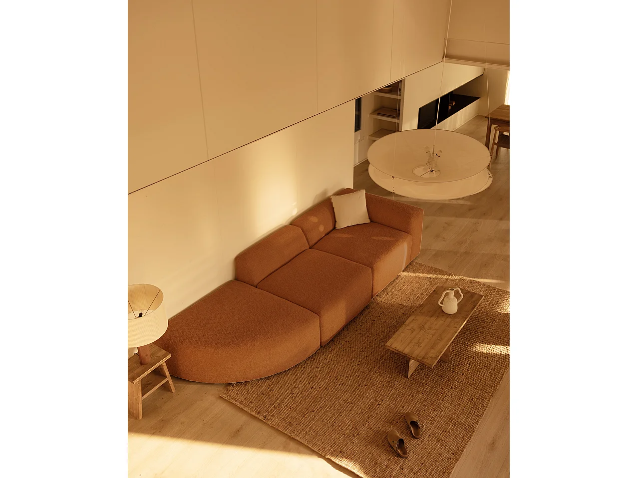 Divano a 3 moduli con curva a sinistra in bouclé colore rame 320x110cm