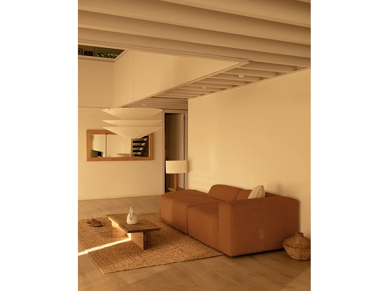 Divano a 3 moduli con curva a sinistra in bouclé colore rame 320x110cm