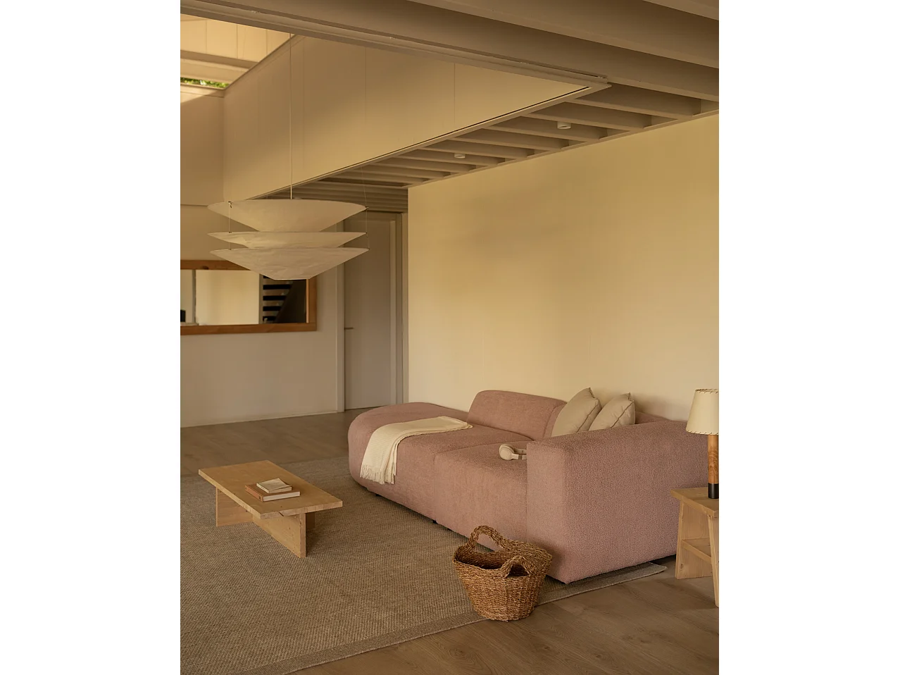 Divano a 3 moduli con curva a sinistra in bouclé rosa 320x110cm