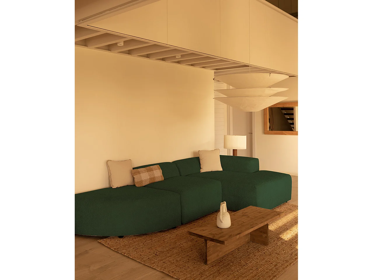 Divano curvo a 3 moduli con CHL destra in bouclé verde 320x172cm