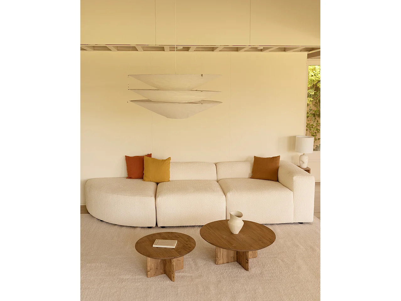 Divano a 3 moduli con curva a sinistra in bouclé bianco 320x110cm
