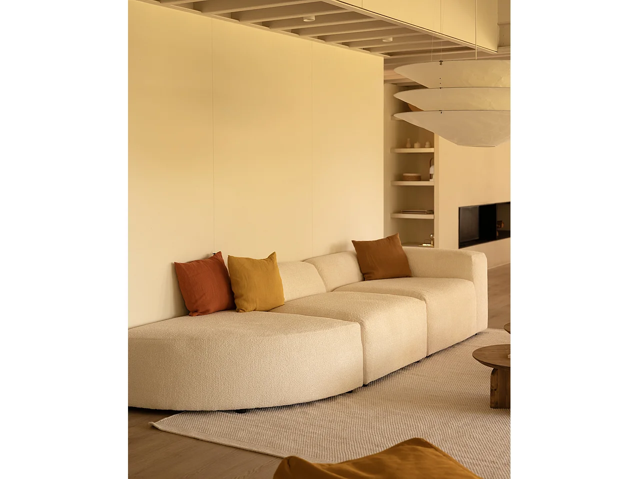 Divano a 3 moduli con curva a sinistra in bouclé bianco 320x110cm