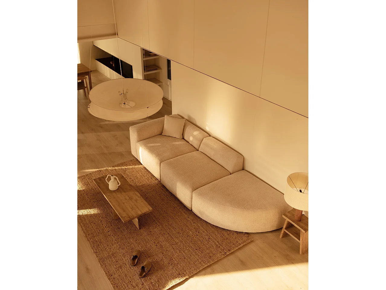 Divano a 3 moduli con curva a destra in bouclé colore beige 320x110cm