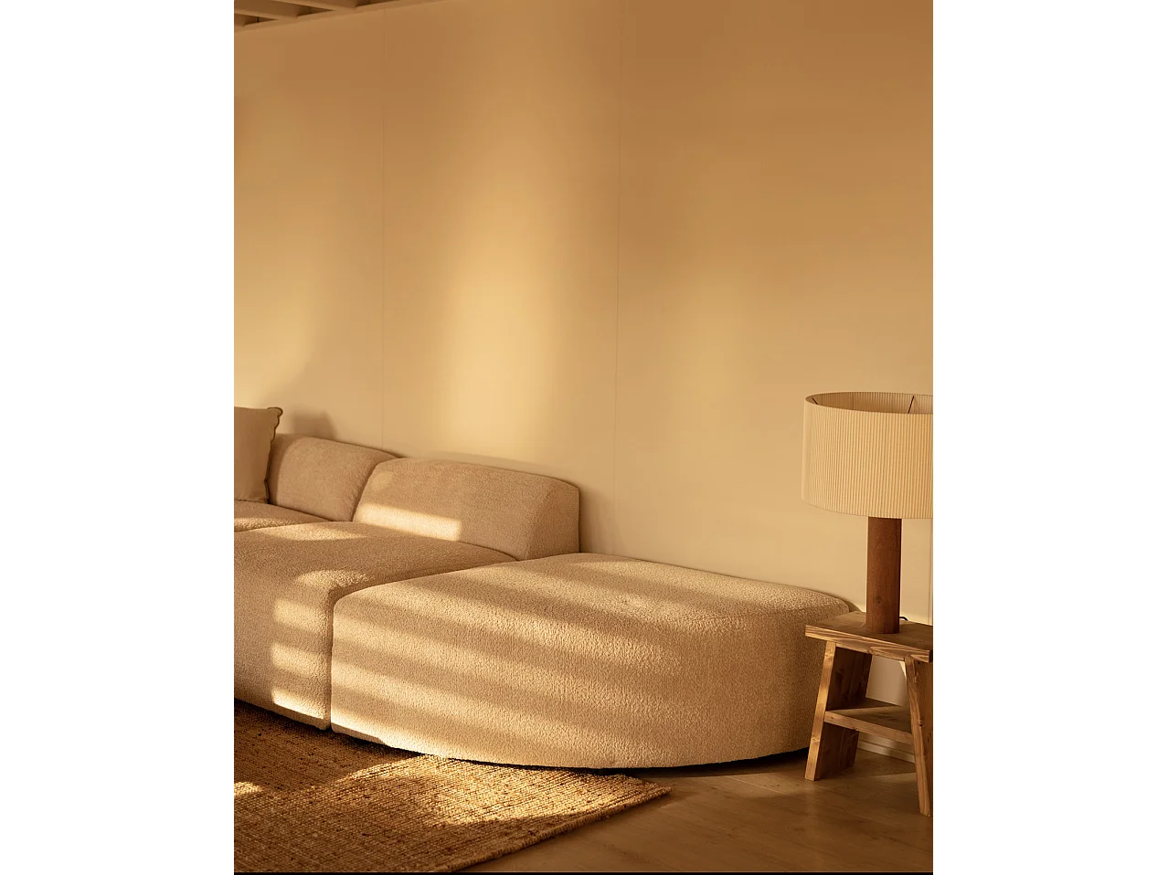 Divano a 3 moduli con curva a destra in bouclé colore beige 320x110cm