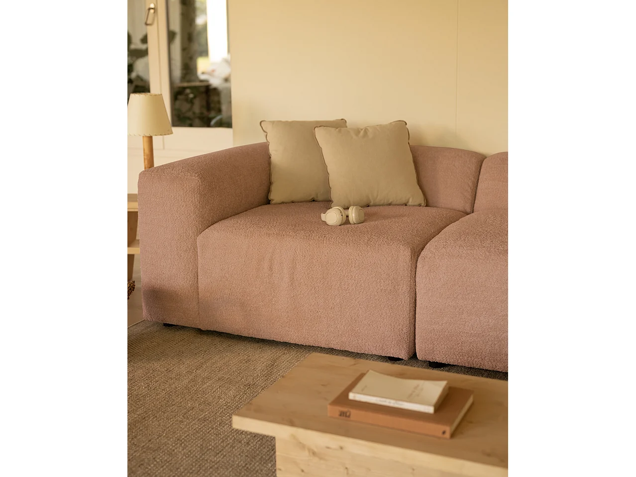 Divano a 3 moduli con curva a destra in bouclé rosa 320x110cm