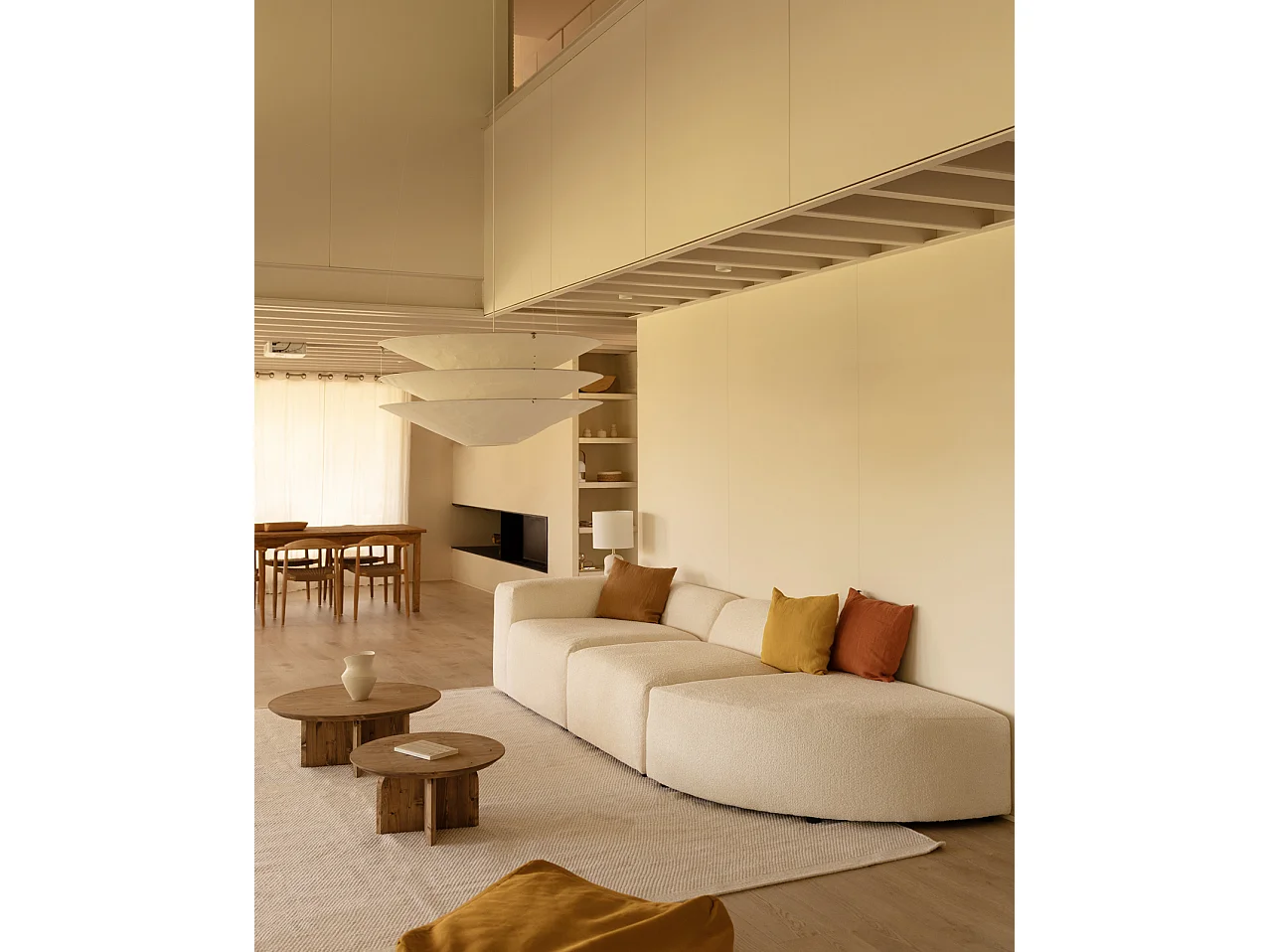 Divano a 3 moduli con curva a destra in bouclé bianco 320x110cm