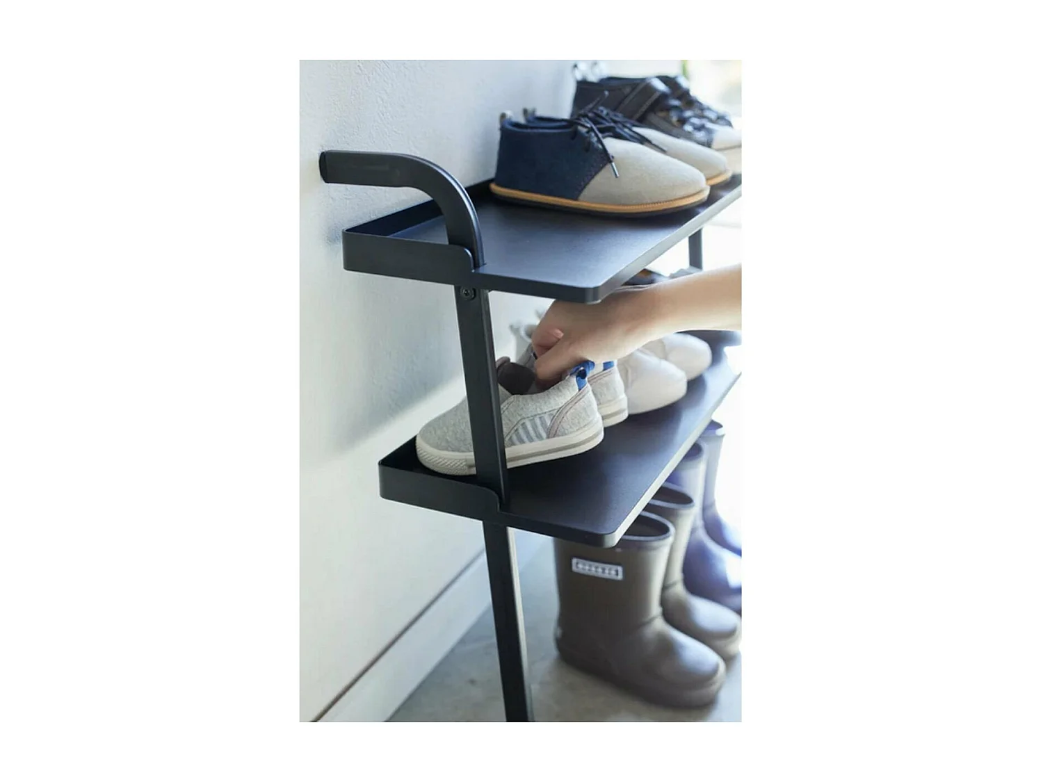 Estante de zapatos para niños de metal negro