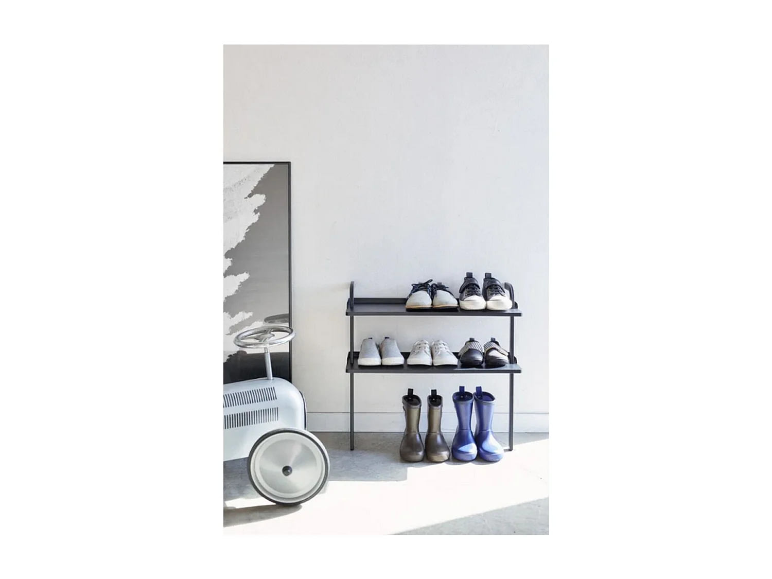 Estante de zapatos para niños de metal negro