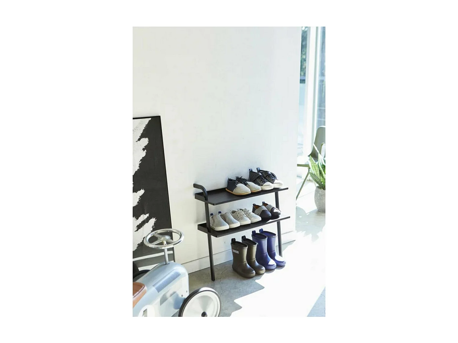 Estante de zapatos para niños de metal negro