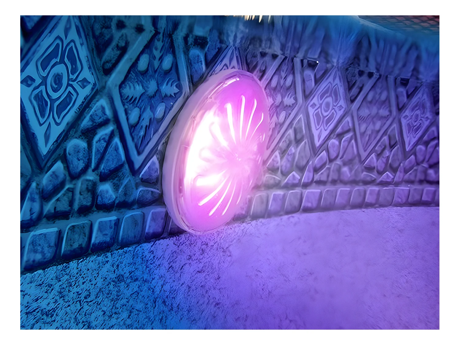 Farbiger LED-Scheinwerfer für Aufstellbecken aus Stahl - Gré