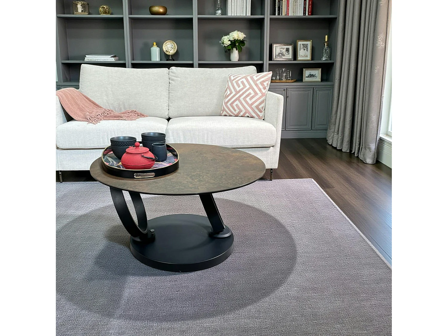 Table basse pivotante en céramique bronze LOMBARDIE