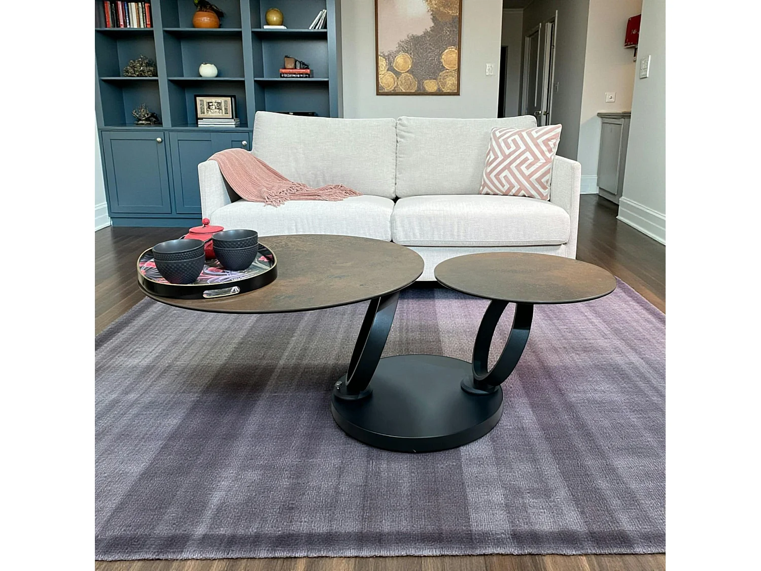 Table basse pivotante en céramique bronze LOMBARDIE