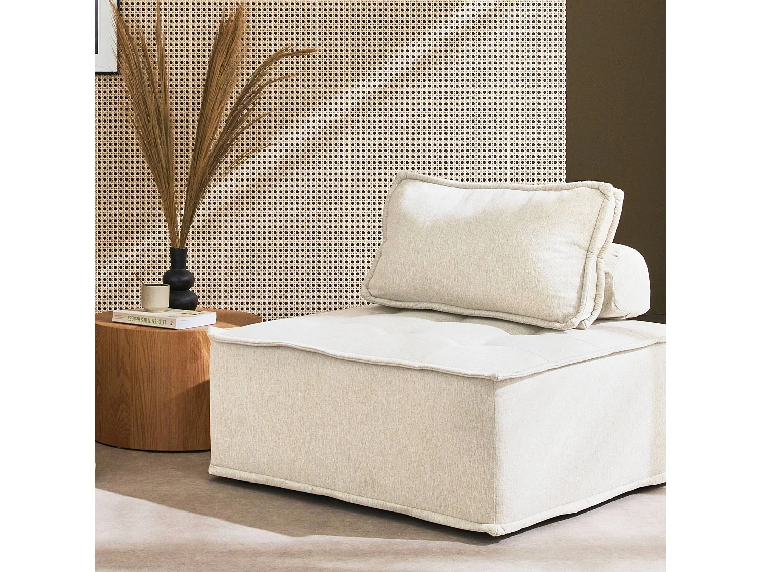 Chauffeuse pour canapé modulable tissu capitonné crème avec un coussin