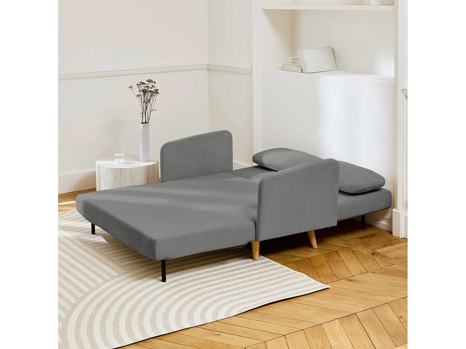 Sofá cama de pana de 2 plazas con patas de madera gris claro