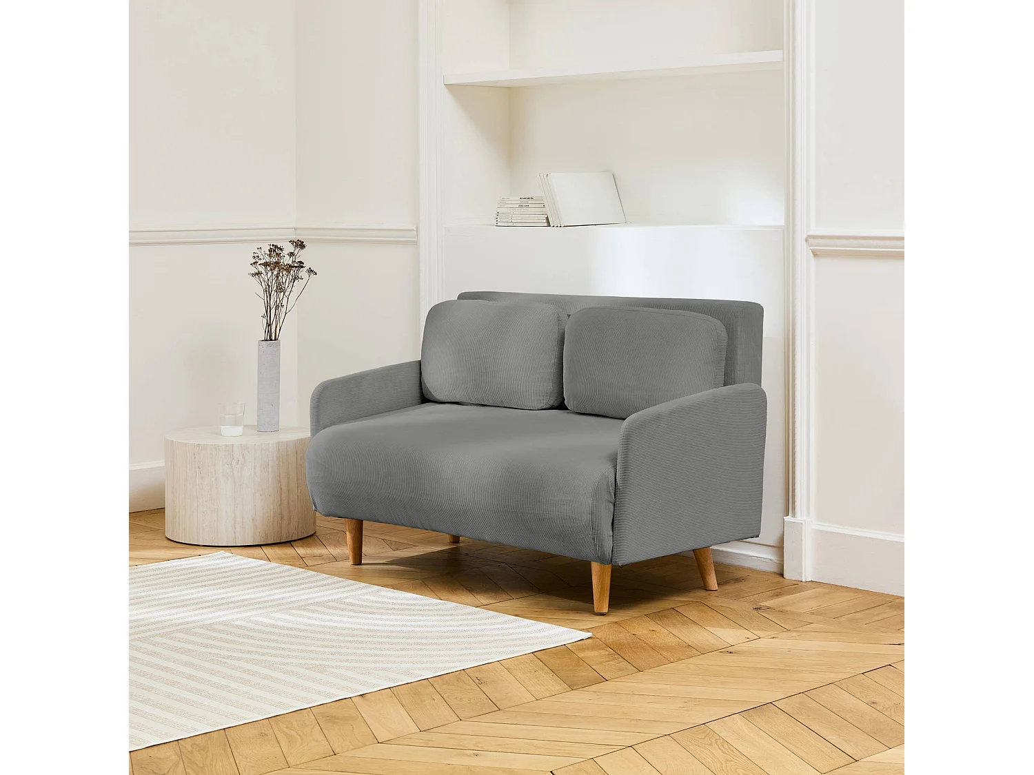 Sofá cama de pana de 2 plazas con patas de madera gris claro