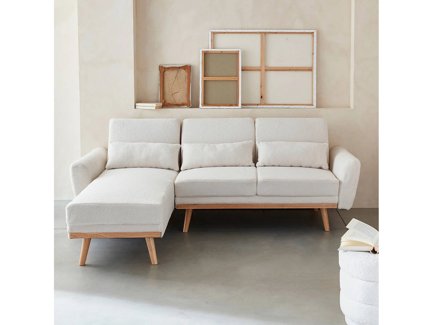 Canapé d'angle convertible réversible 3 places. tissu bouclettes crème. pieds bois