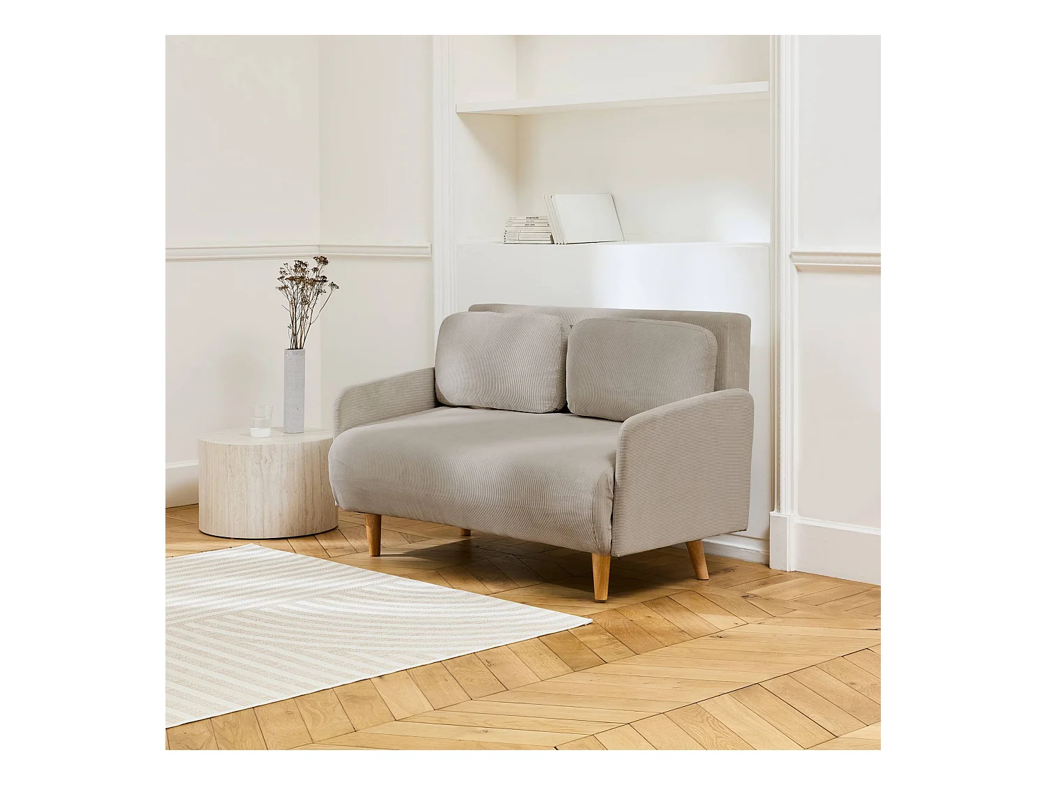 Sofá cama de pana de 2 plazas con patas de madera beige