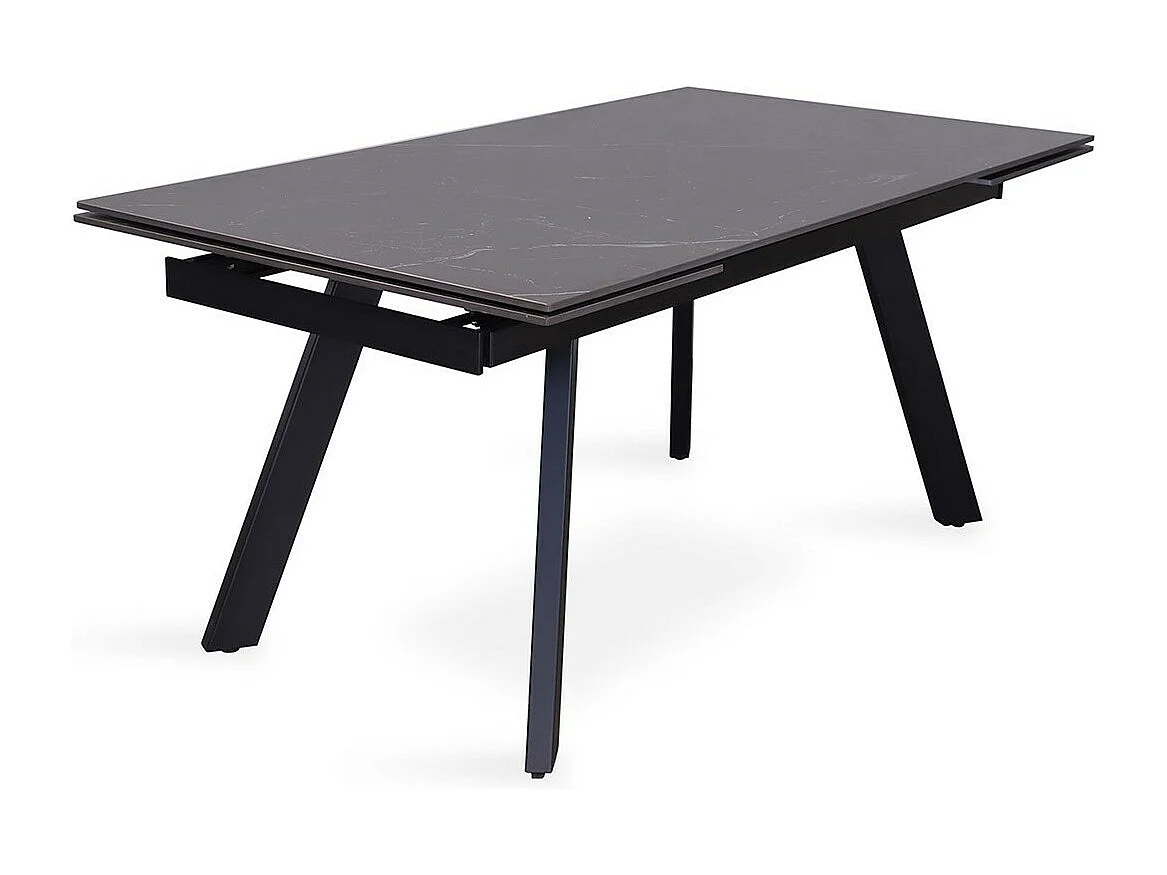 Uitschuifbare eettafel voor 10 personen met een zwart stenen blad uit de LAROS collectie. Structuur van metaal.