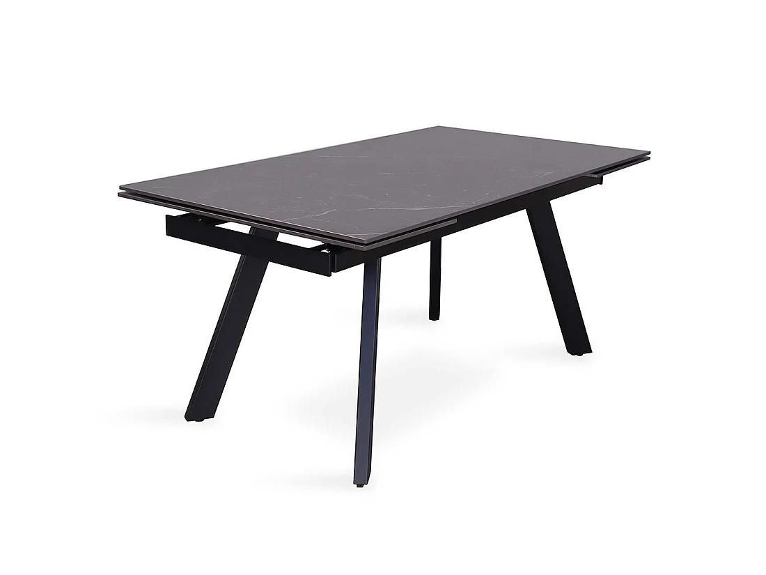 Table à manger extensible pour 10 personnes avec plateau en pierre noire collection LAROS. Structure en métal.